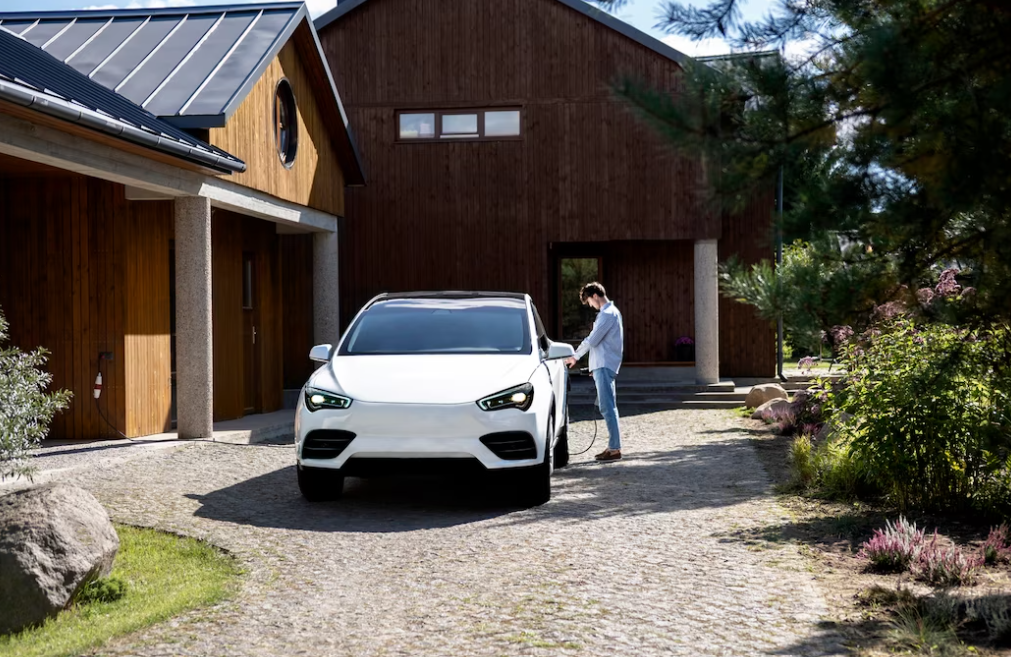 person taking care of electric car