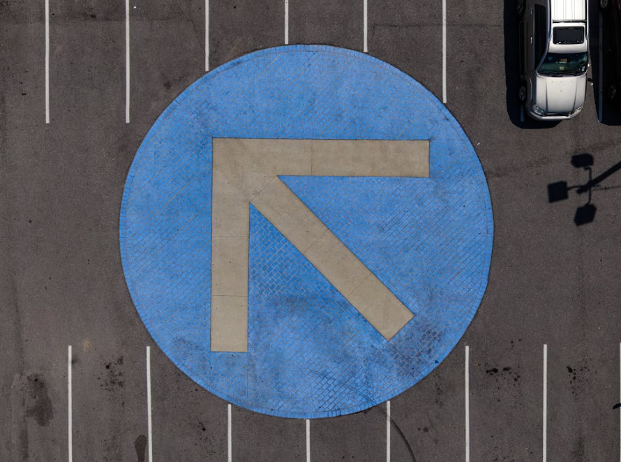 Round Blue and Gray Arrow Symbol